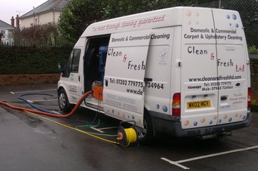 Our truck mounted carpet cleaning machine cleaning carpets in a commercial building